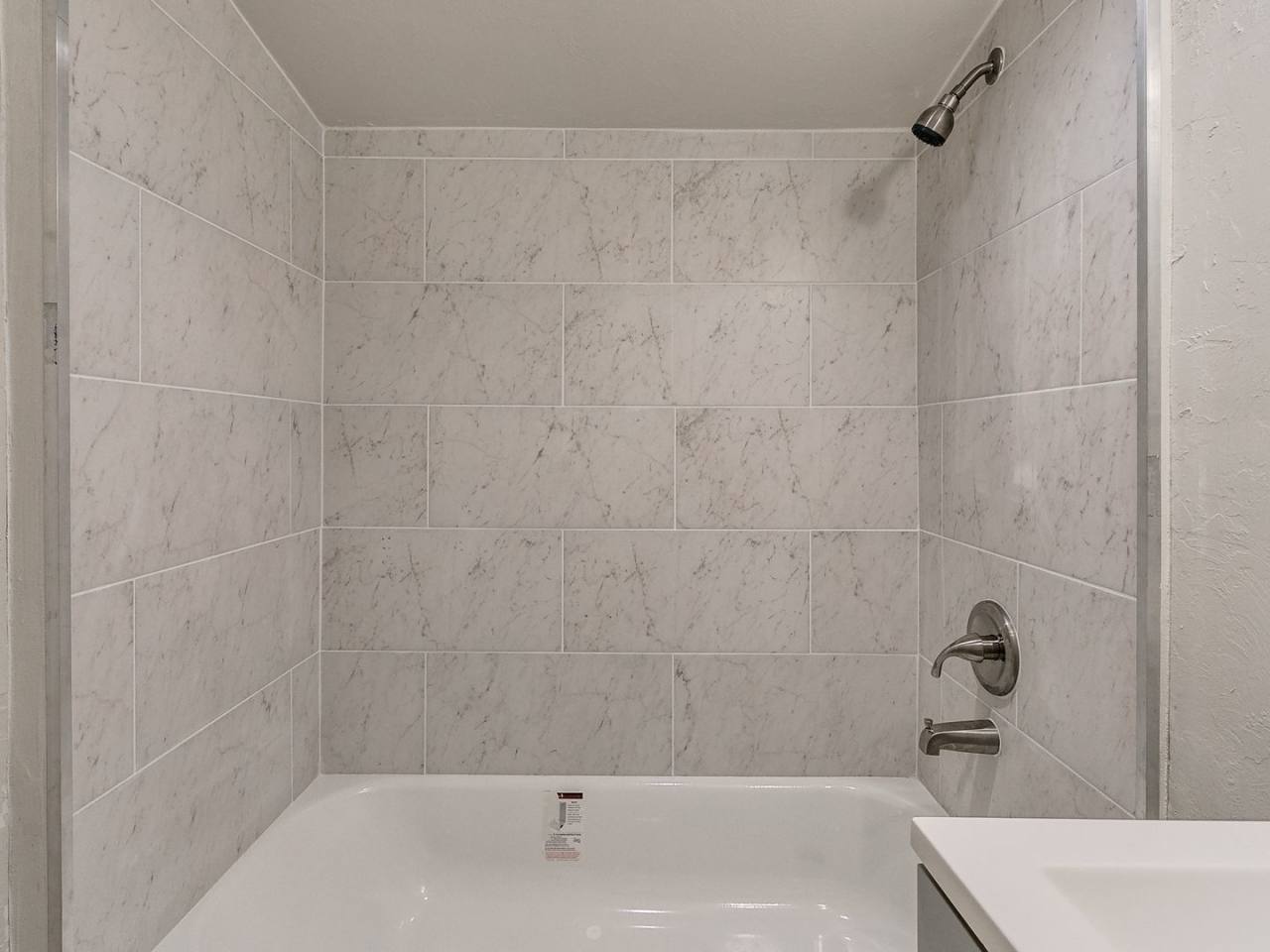 Newly renovated efficancy with fenced yard.