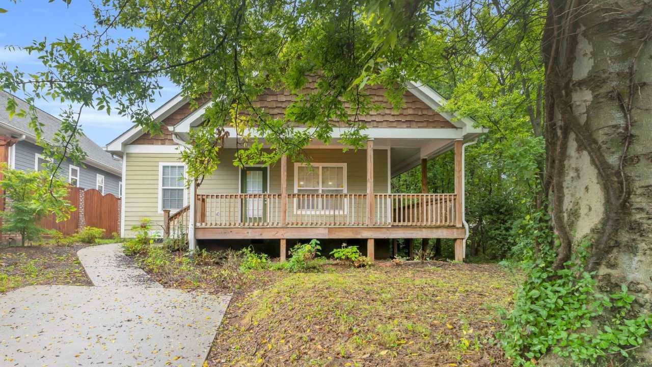 Nestled between Southside  St. Elmo - 3 beds, 2 baths, hardwood throughout, next to Harrison Johnson Park!