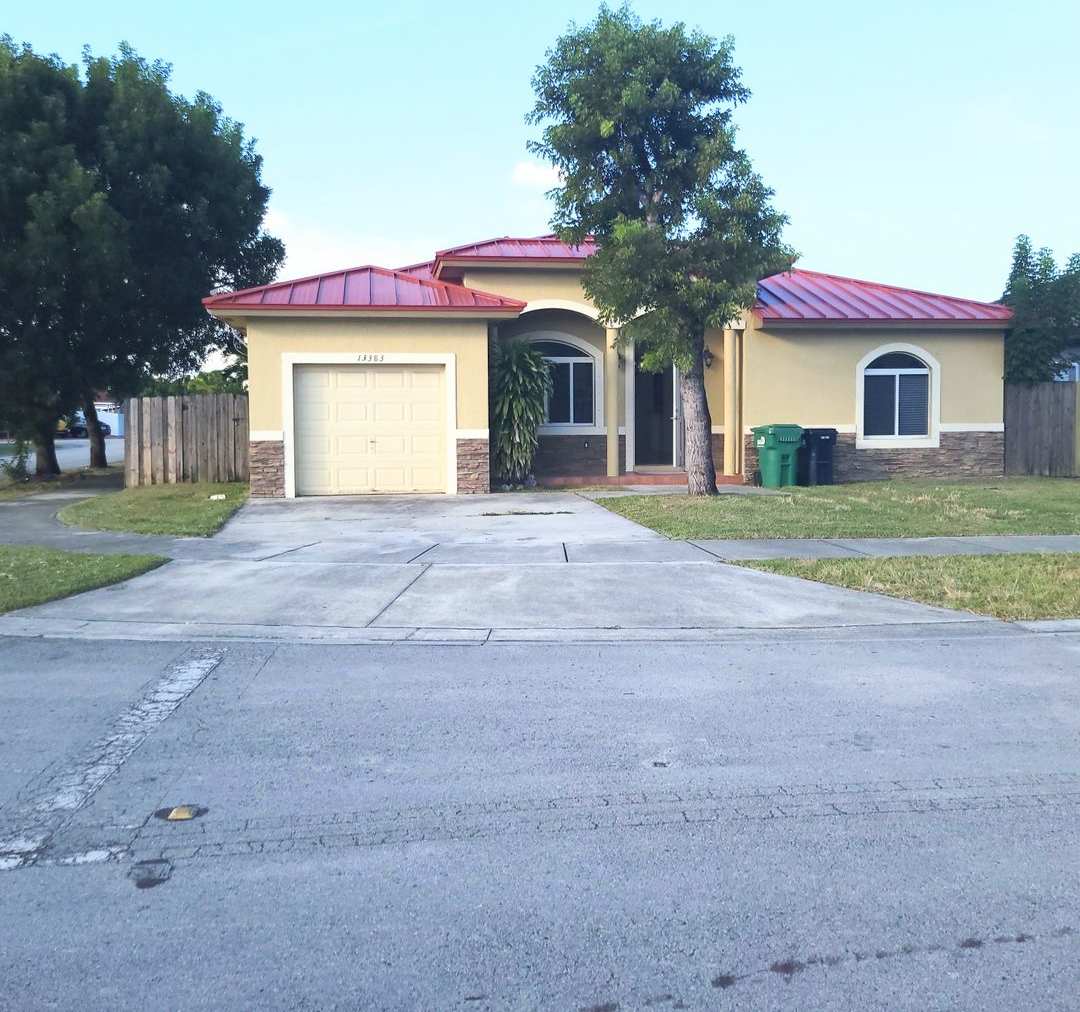 Single-story, 3/2.5 corner lot located near multiple FL Turnpike exits