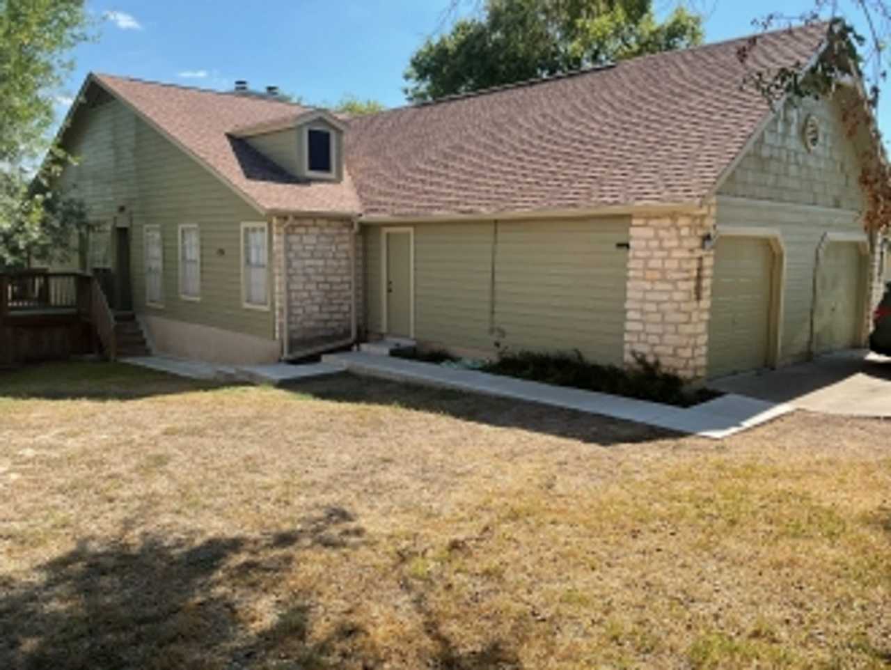 This incredible three bedroom home is minutes away from Lake Travis