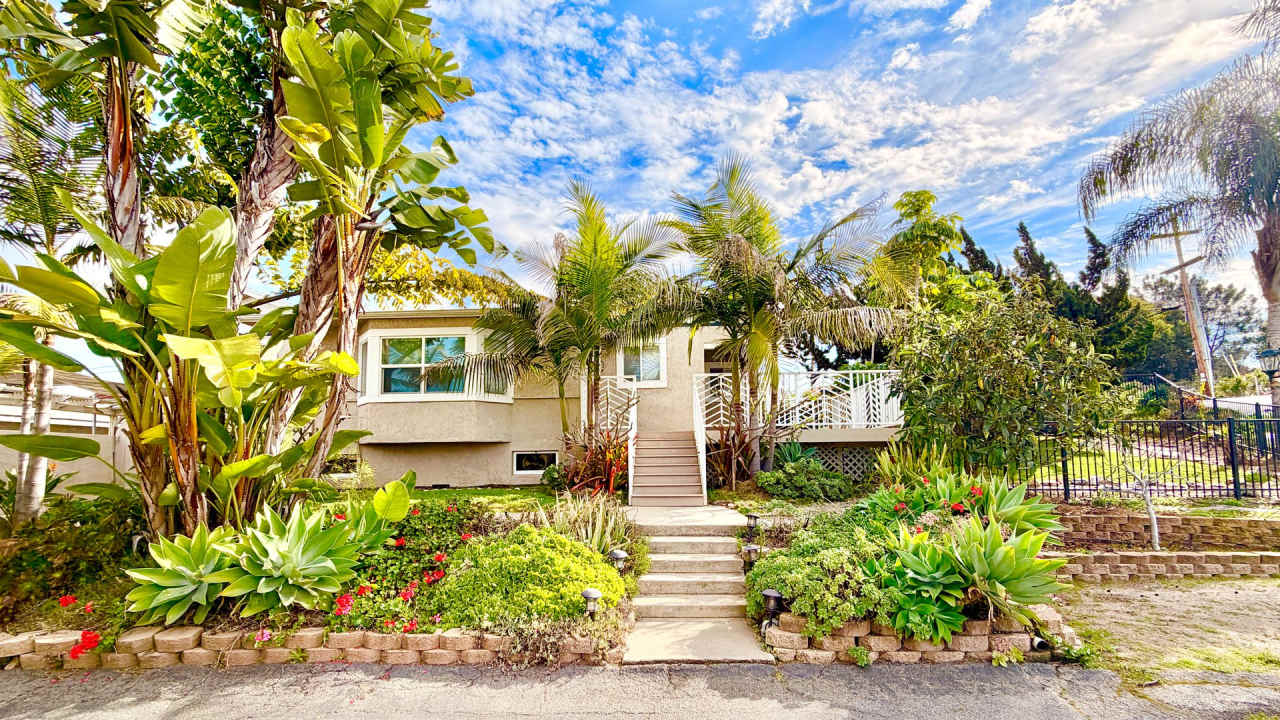 Beautiful Craftsman-style Home with fenced yard space, detached garage and additional parking in Vista!