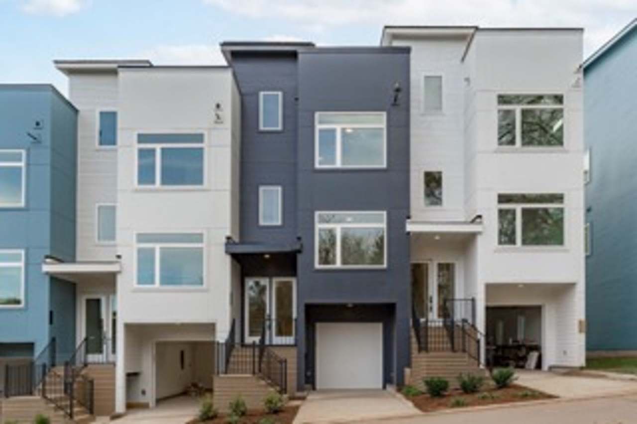 **OFFERING 50% OFF FIRST MONTH'S RENT, WAIVED APPLICATION FEES  $300 MOVE IN PROMOTION** Luxurious New Construction 4BD, 4BA Downtown Raleigh Townhome with Rooftop Terrace