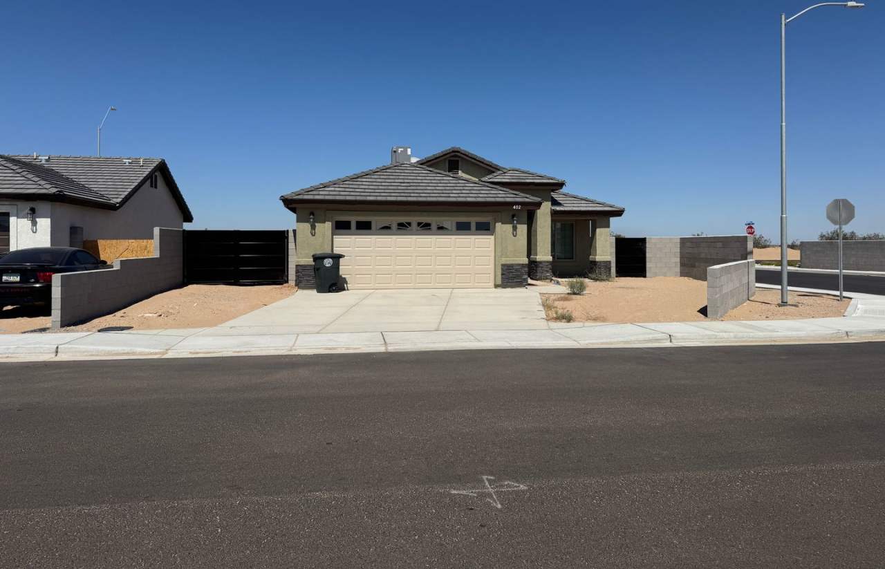 Newer 3 bedroom home with 2 car garage on a Fully Fenced Corner Lot