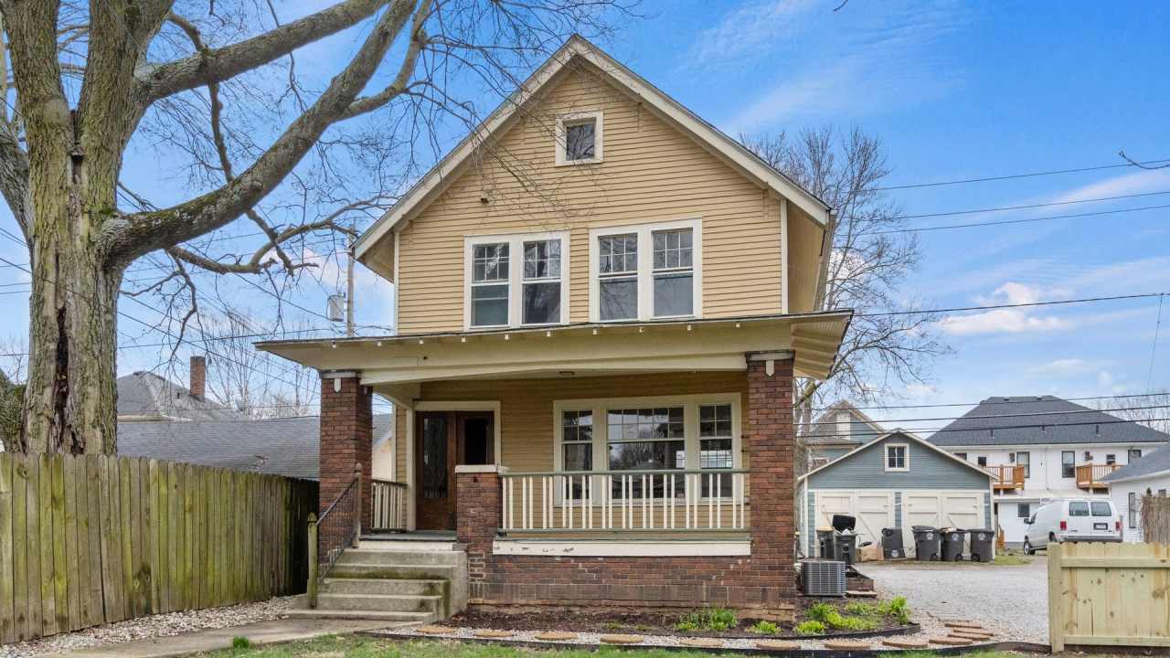 Single-family historic home in West Central with porch and private courtyard.