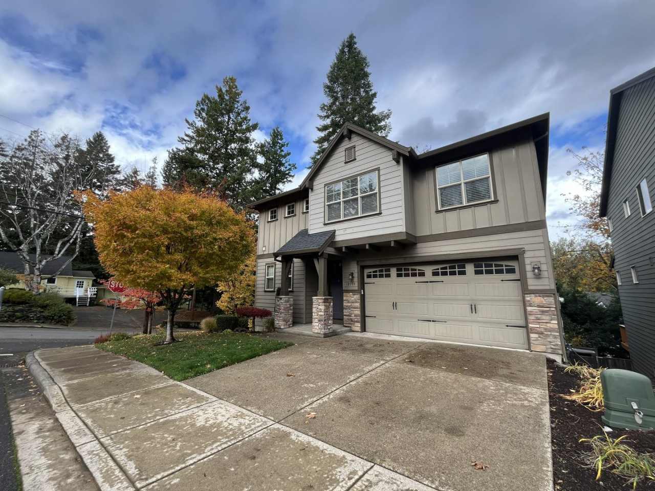 Spacious Corner-Lot Home with Three Levels, Multiple Living Areas, and Lush Outdoor Spaces