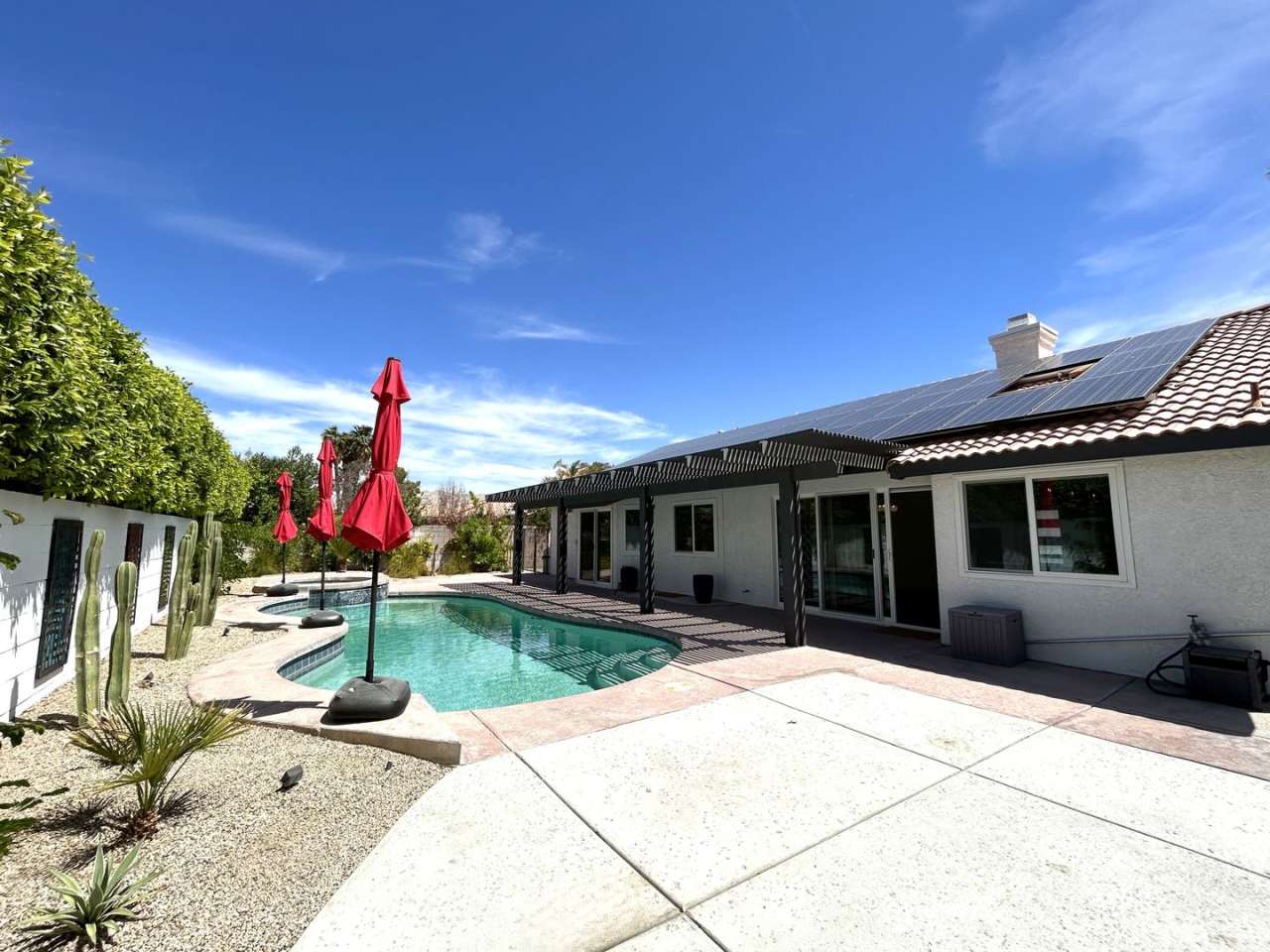 AVAILABLE NOW! Beautifully UPDATED 4 Bedroom 2 Bathroom Cathedral City POOL HOME WITH 48 SOLAR PANELS!