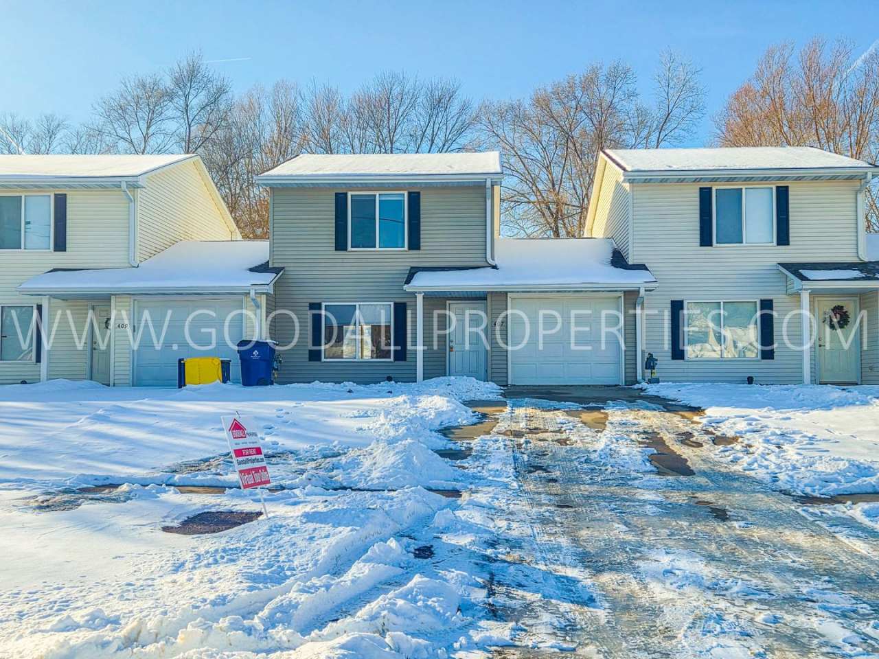 Check out this 3-bedroom, 1.5-bath townhome in Van Meter, complete with an attached garage.