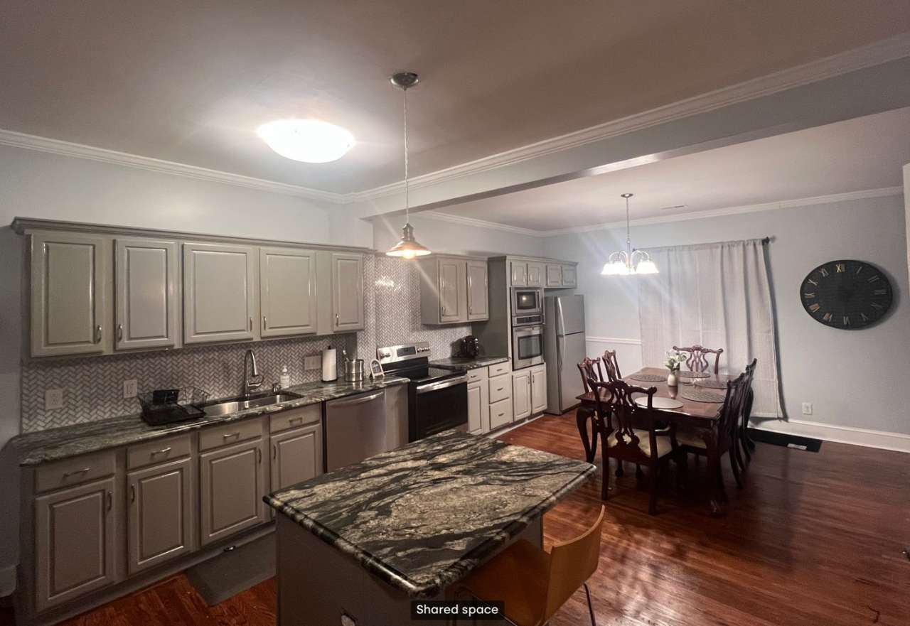 Room in 4 Bedroom Home at West Blvd