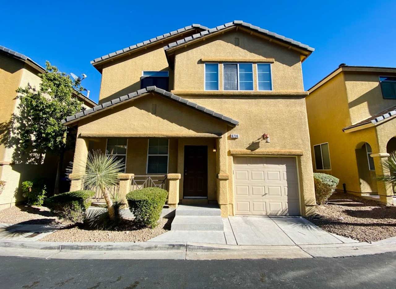 Gorgeous two story home with 3 bedrooms/3 baths within a gated community in the SW area.