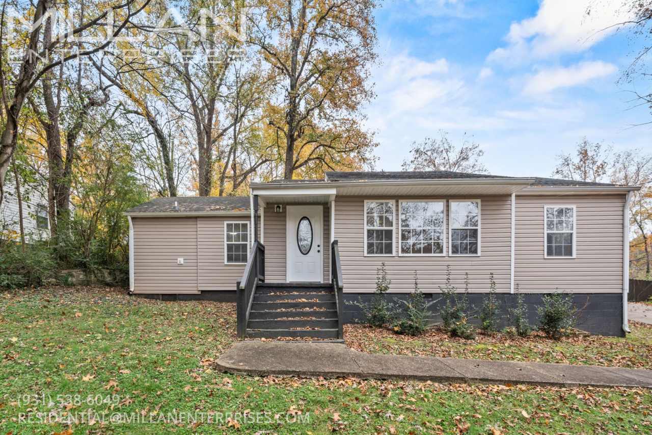 Charming Three Bedroom Home with Natural Privacy and Prime Location