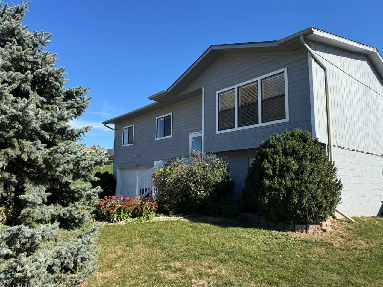 Bright and spacious split-entry home with a finished lower level, large yard, and plenty of updates!