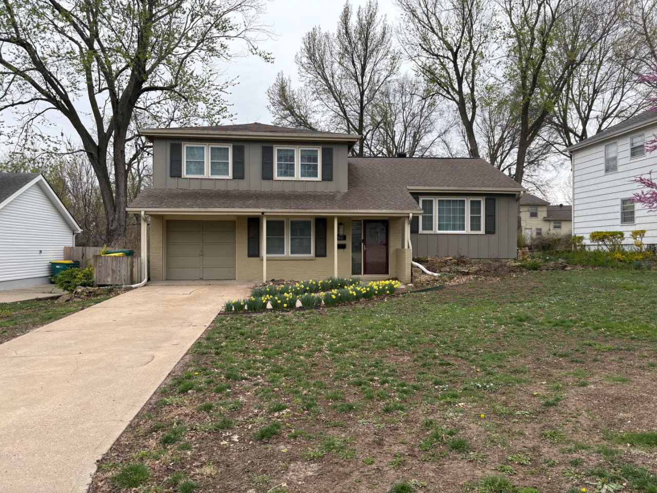 {9111} Updated home in Prime North Overland Park Location + Spacious Floor Plan with Two Living Areas + Modern Kitchen with Granite, Stainless Steel Appliances and Breakfast Bar + Fenced Yard, 1 Car Garage