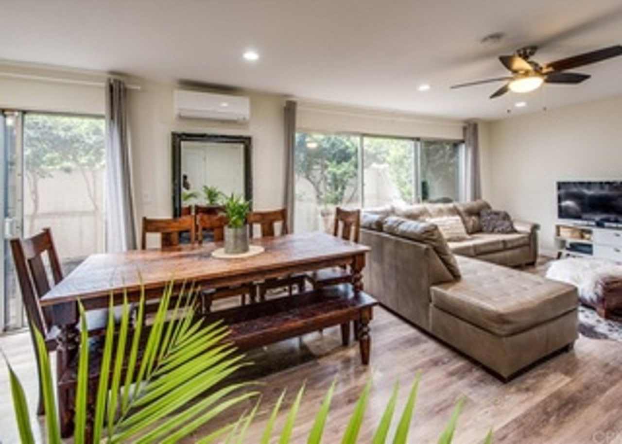 Beautiful and Cozy two story townhome style single family residence in Tustin Village!