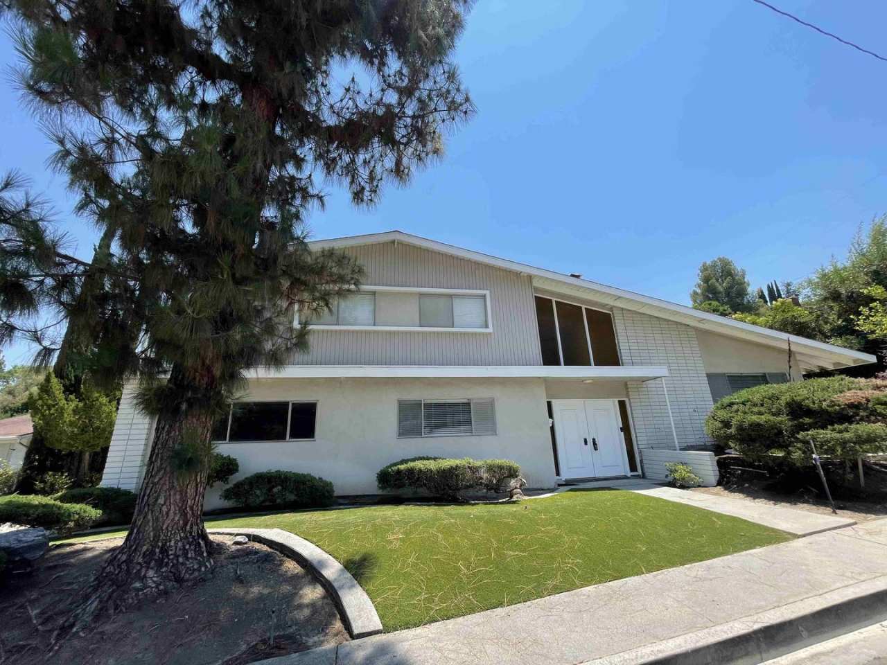 SOUTH OF THE BLVD. HOME IN WOODLAND HILLS!