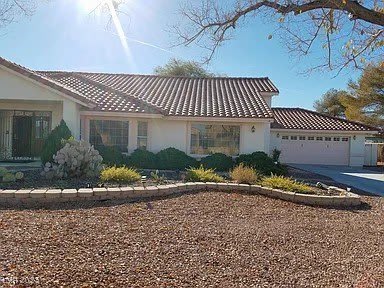 7595 W Camero Avenue