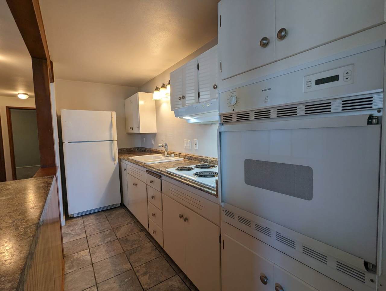 Spacious 2-Bedroom, 1-Bath Apartment With Solid Surface Floors!