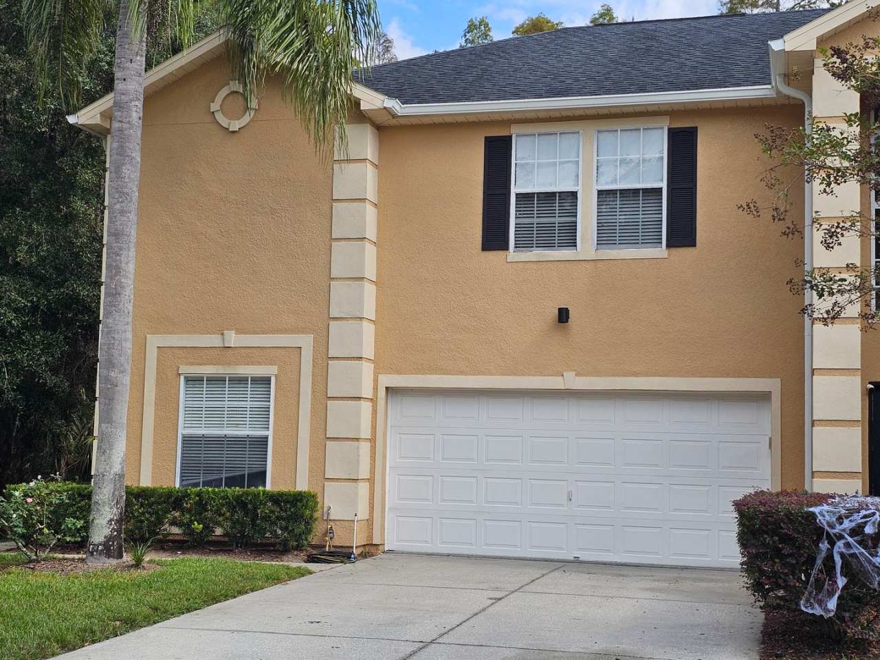 Gated Tampa Palms Townhome with 2 car garage