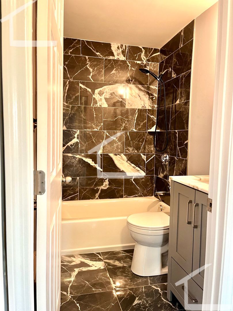 Brand new renovated 2 bed in Newton with parking and in-unit laundry!