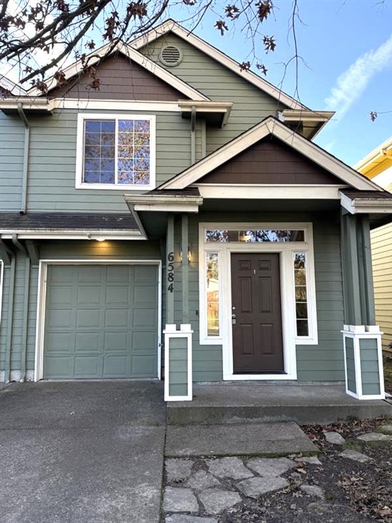 6584 NW Dogwood Street ~ Delightful Newly Refurbished Duplex!