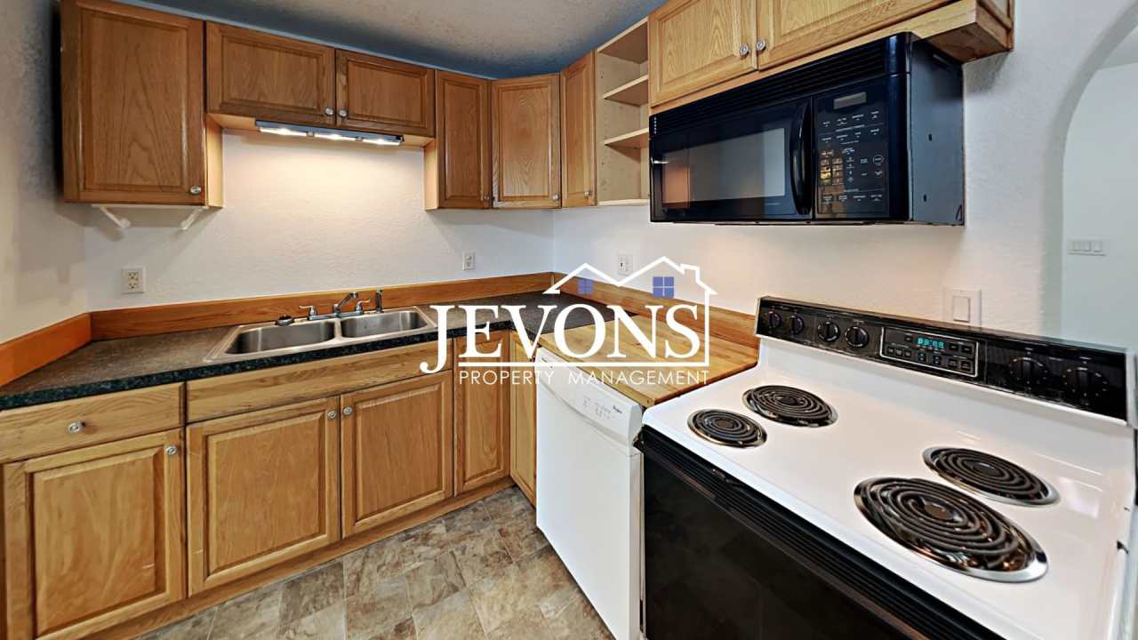 Two-story home in a walkable location, just minutes from Yakima Valley College, featuring long driveway parking