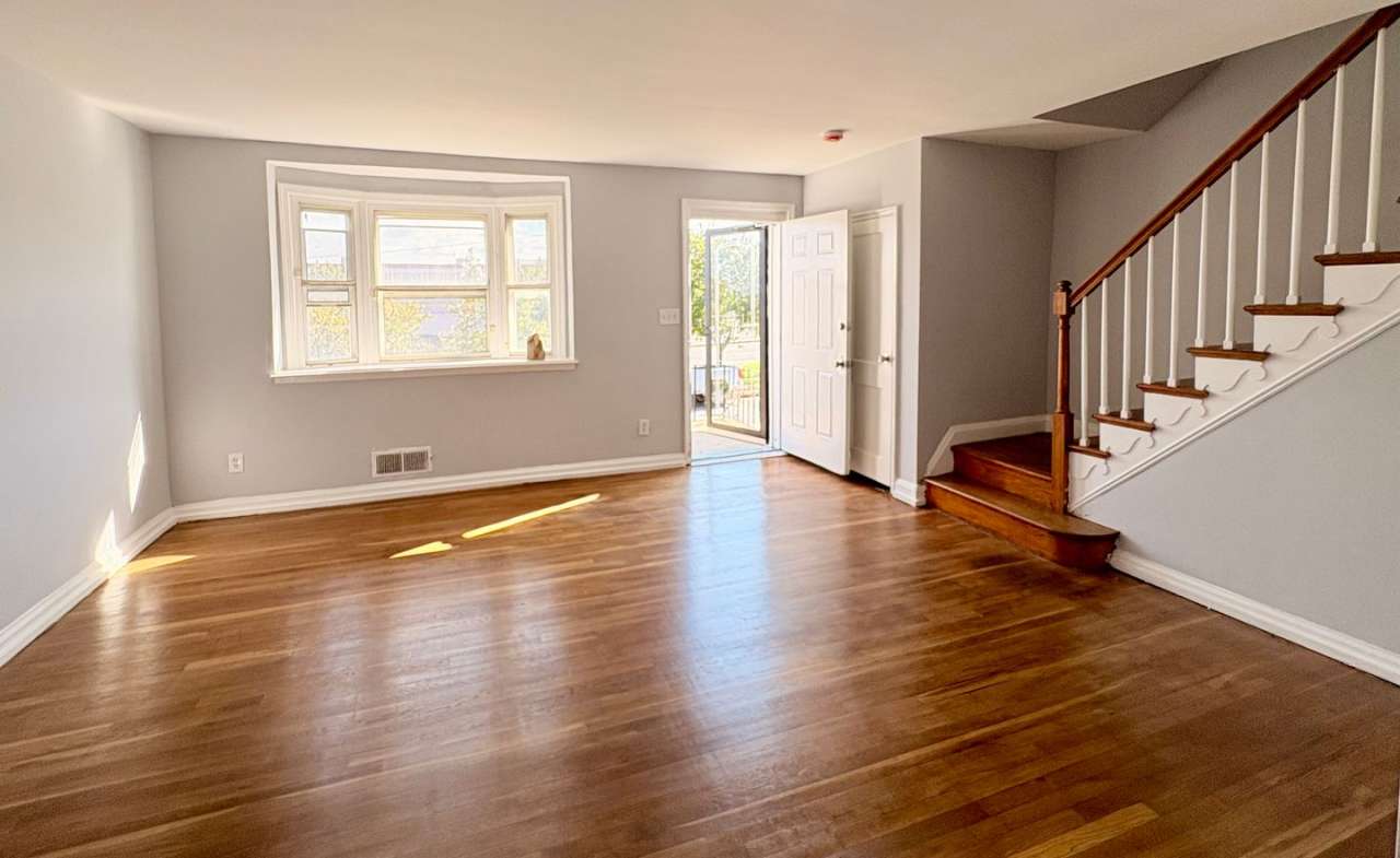 Charming Brick Home with Finished Basement, Modern Kitchen  Spacious Yard