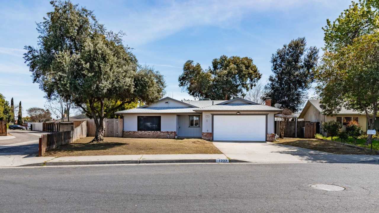 4 bedroom, 2 bath, 2-car garage home on large 14,000+ sq. ft. lot