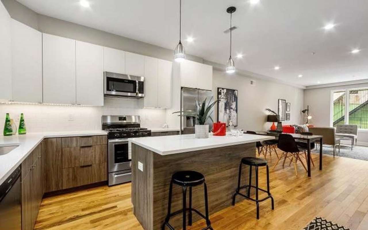 Luxurious 3-Bedroom Townhome with Rooftop Deck and Finished Basement! Available mid-May!