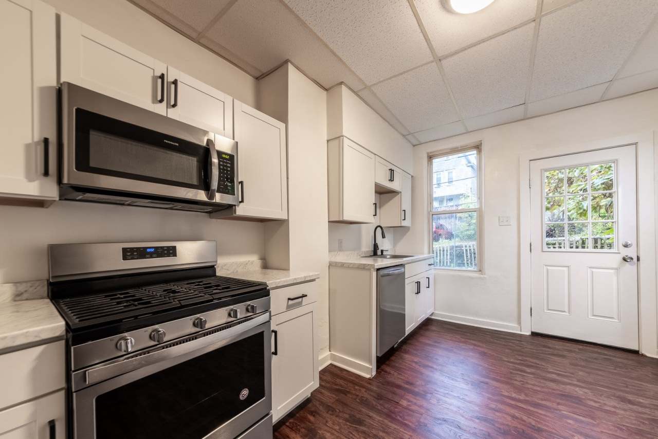 AVAILABLE NOW- Updated 4+ Bedroom Townhouse Located on the Bus Line!