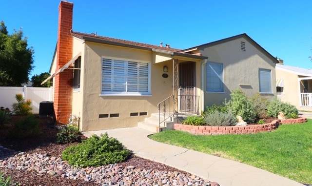 Beautiful 2 Bedroom, 1 Bath Talmadge Home with Hardwood Floors - Great Curb Appeal!