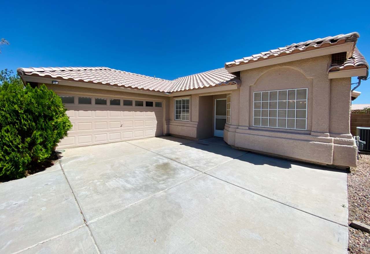 Spacious single story 3 bed 2 bath home with renovated kitchen, two way fireplace from family room to formal living room, large covered patio with low maintenance desert landscaping. Located on a cul de sac street!
