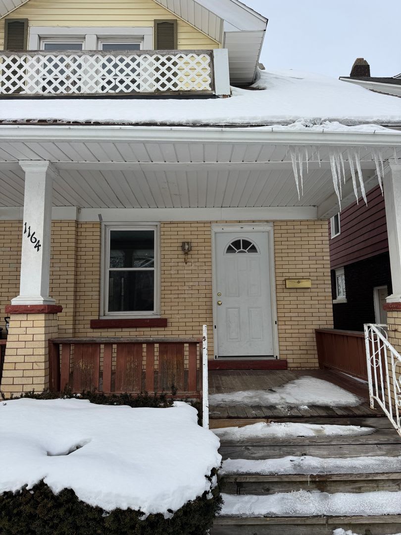 Single Family Home 3 bedroom 1 bath new paint flooring with basement fenced in yard