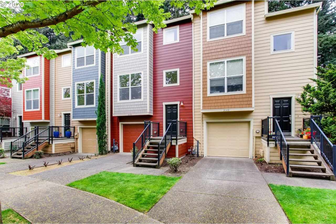 Forest-View Three-Level Townhome with Ensuite Bedrooms, Attached Garage  Fenced Yard