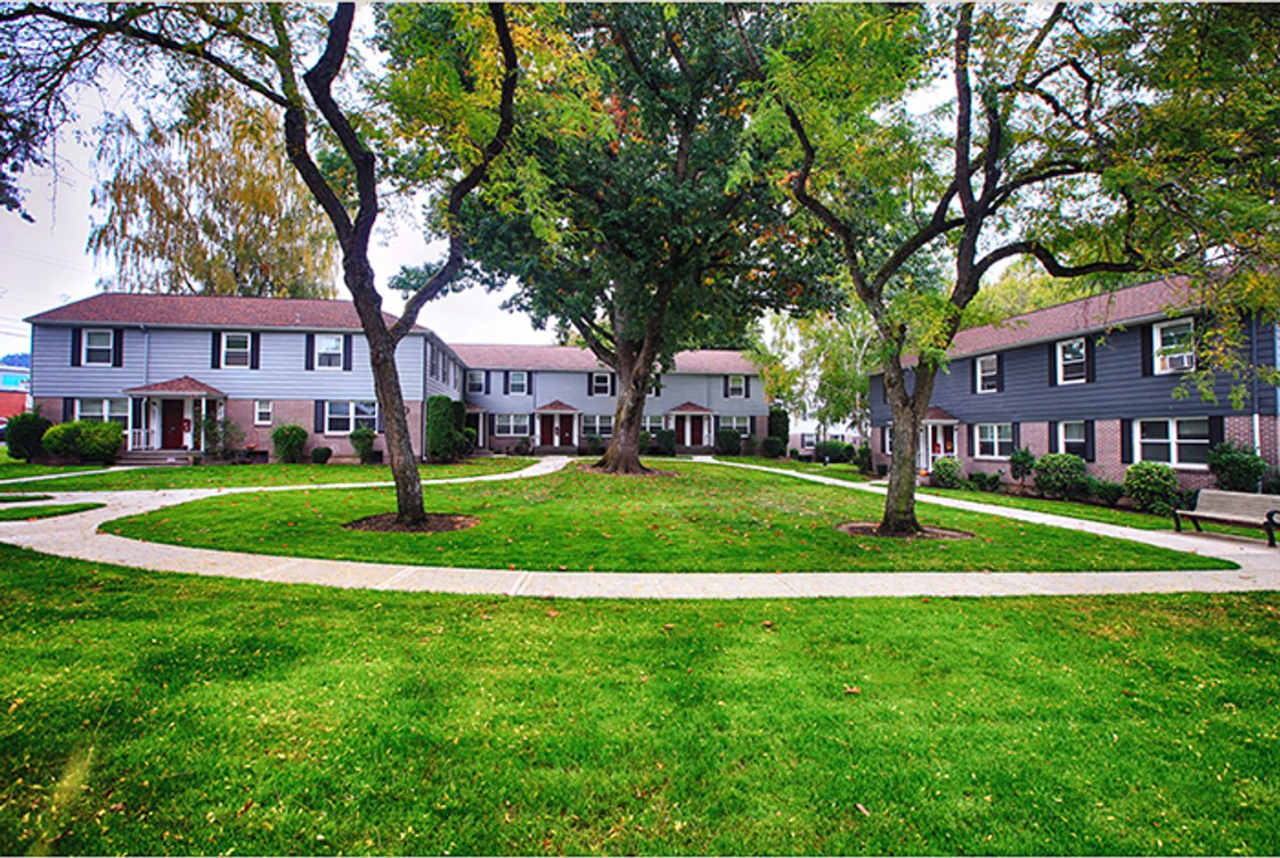 Tranquil Mid-Century Retreat in a Lush Setting!