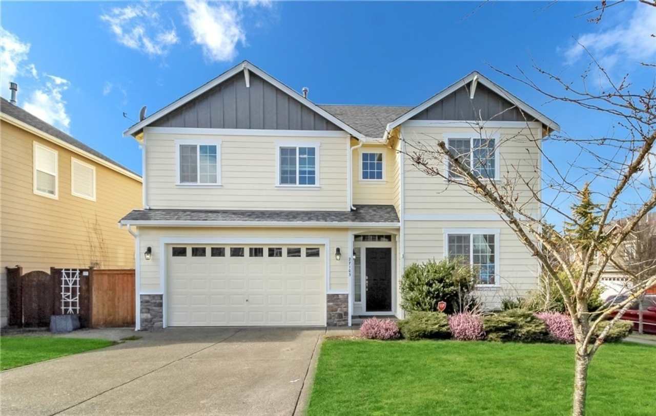 Well Maintained Four Bedroom Home on a Corner Lot at Rock Creek Meadows