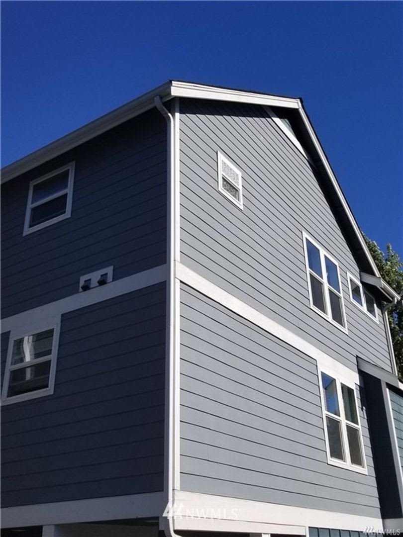 Spacious 4 Bedroom Townhome with Private Fenced Yard!