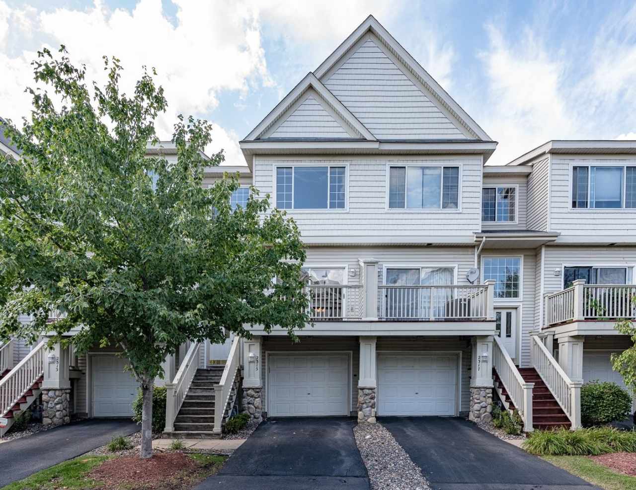 Like New 2 Bed/2 Bath Townhome With Amenities And Attached Garage