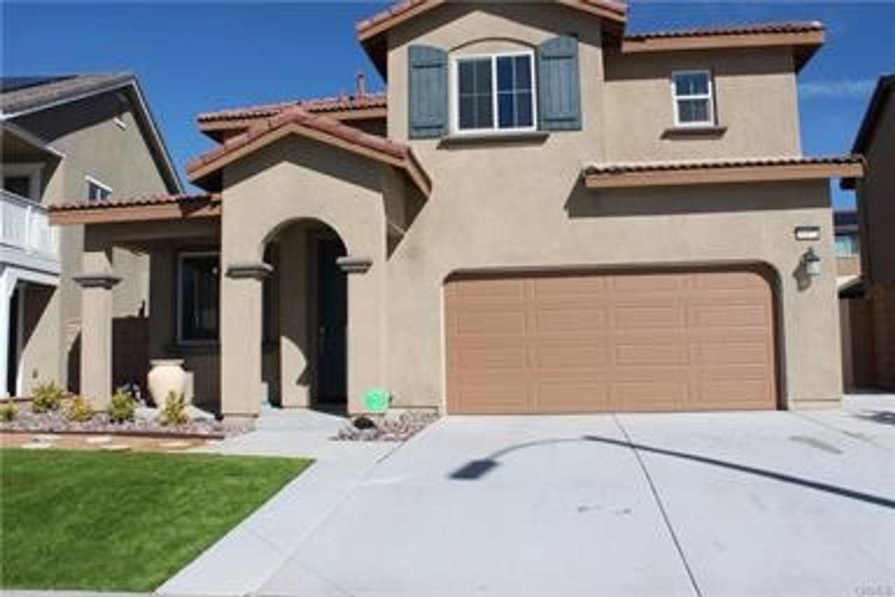 Spacious 4-Bedroom Home with Large Backyard.