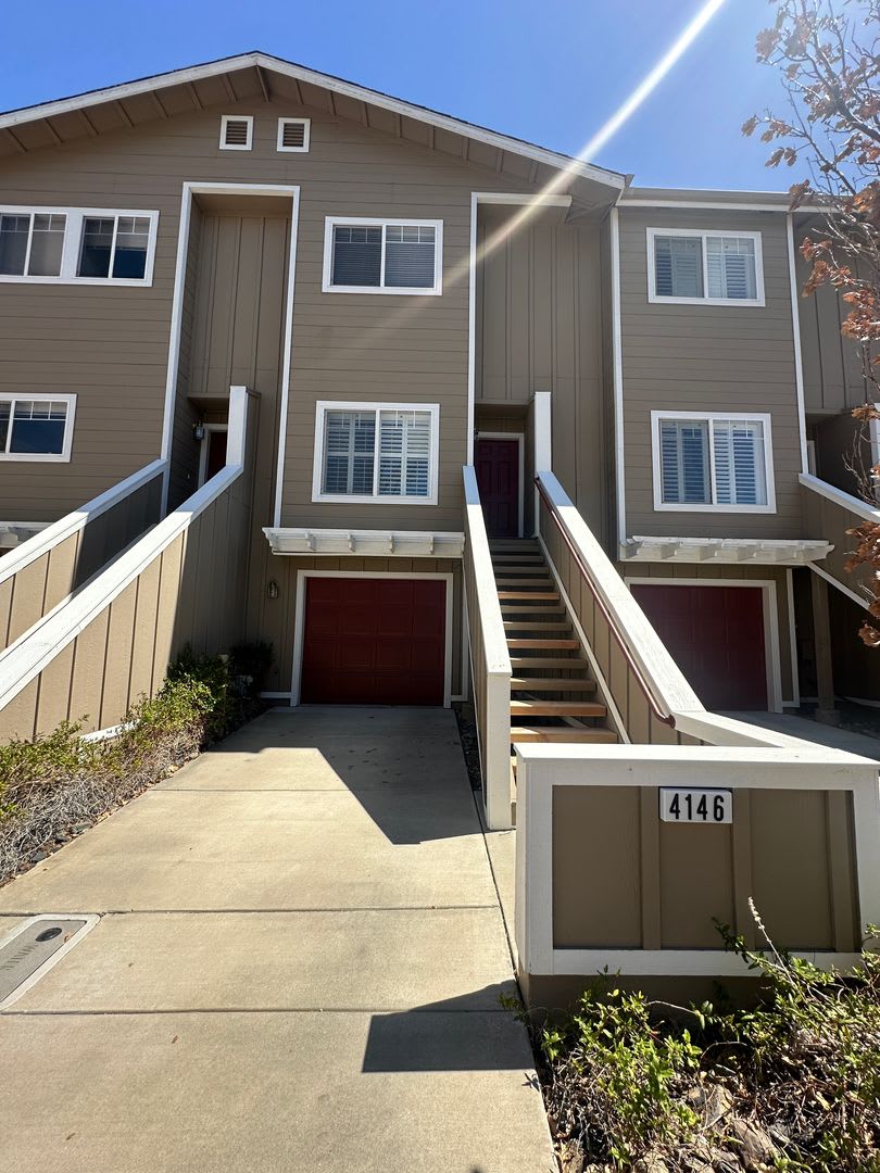 Great Townhome 2 bed 2 1/2 bath 2 car tandem garage.