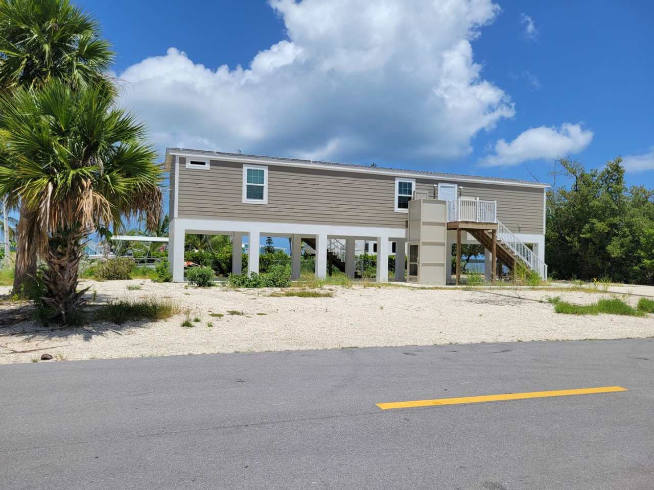 Centrally-Located 2-Bed/2-Bath Home, full perimeter fence with Canal Access