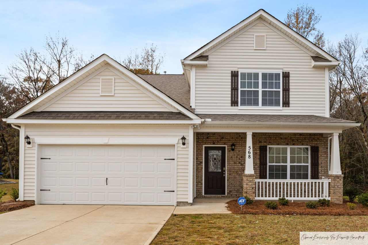 EXECUTIVE HOME IN IRMO'S STONEMONT WITH TWO PRIMARY SUITES