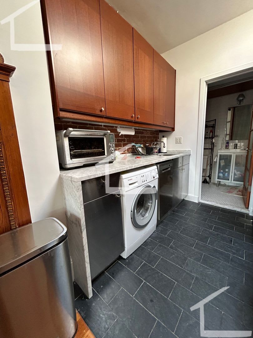 Huge penthouse unit with in unit laundry in prime location near BU!