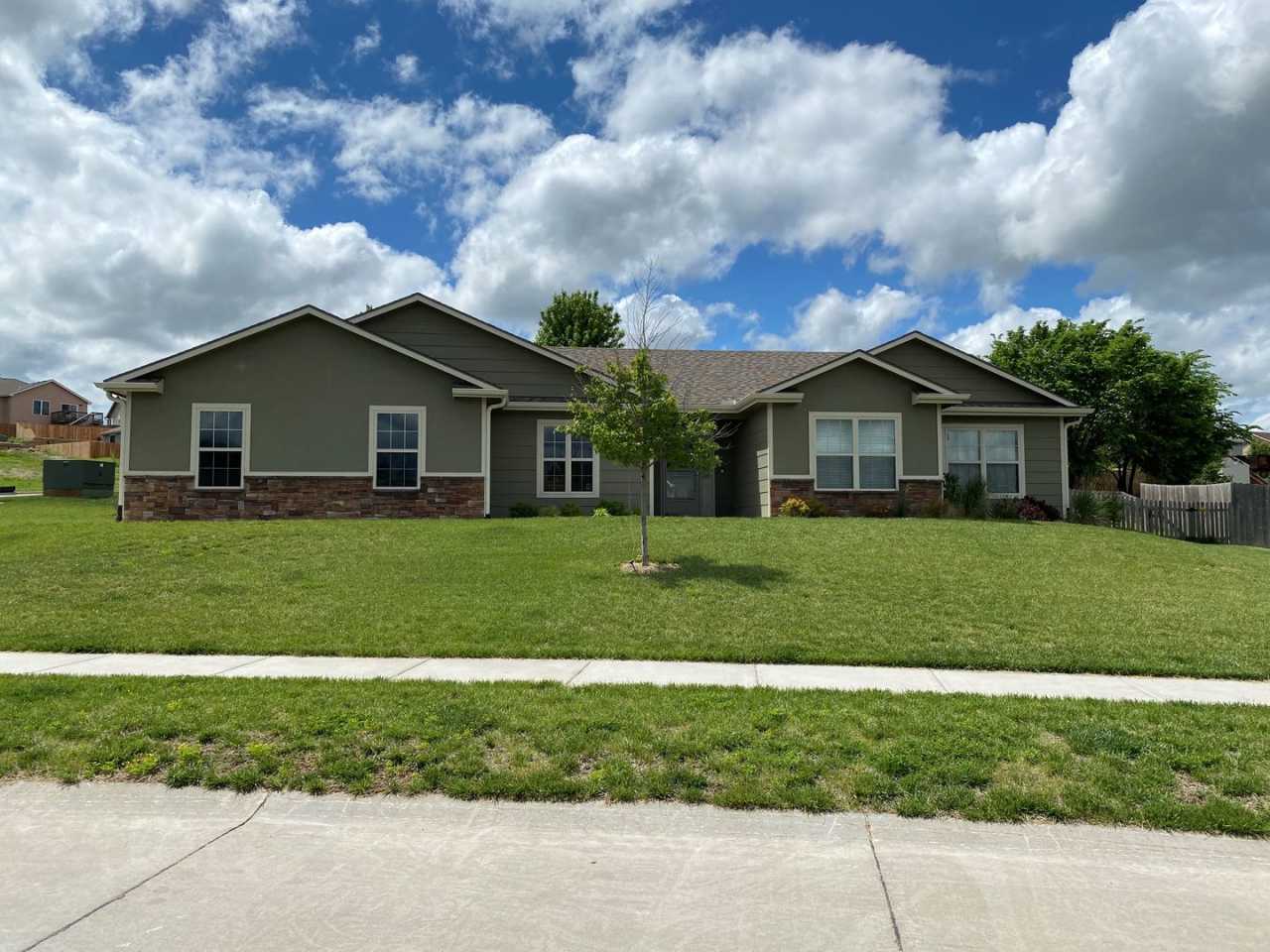 FENCED BACKYARD! BONUS ROOM/OFFICE! SAFE ROOM! THREE CAR GARAGE