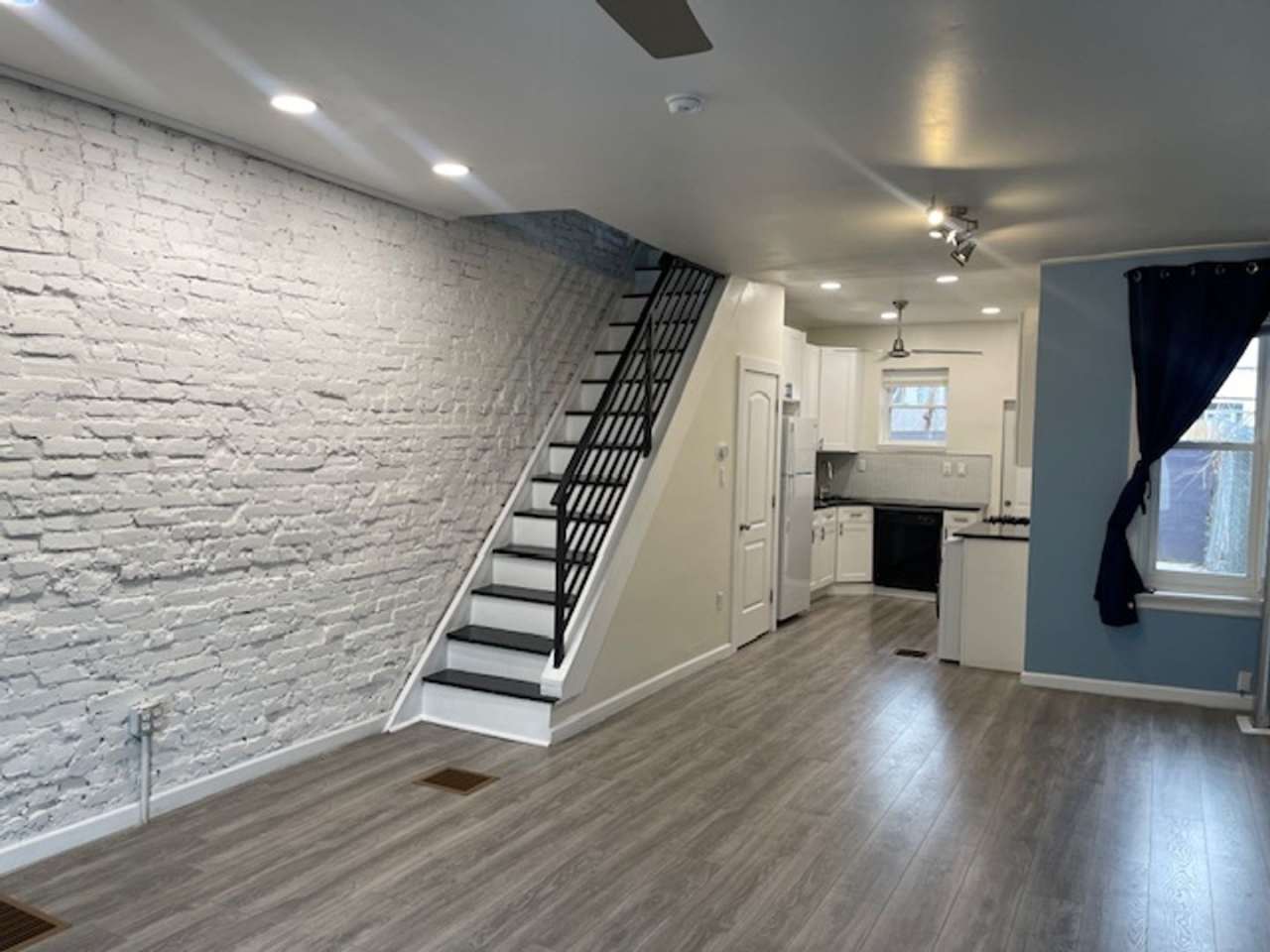 Modern 3-Bedroom Home with Exposed Brick  Private Backyard!