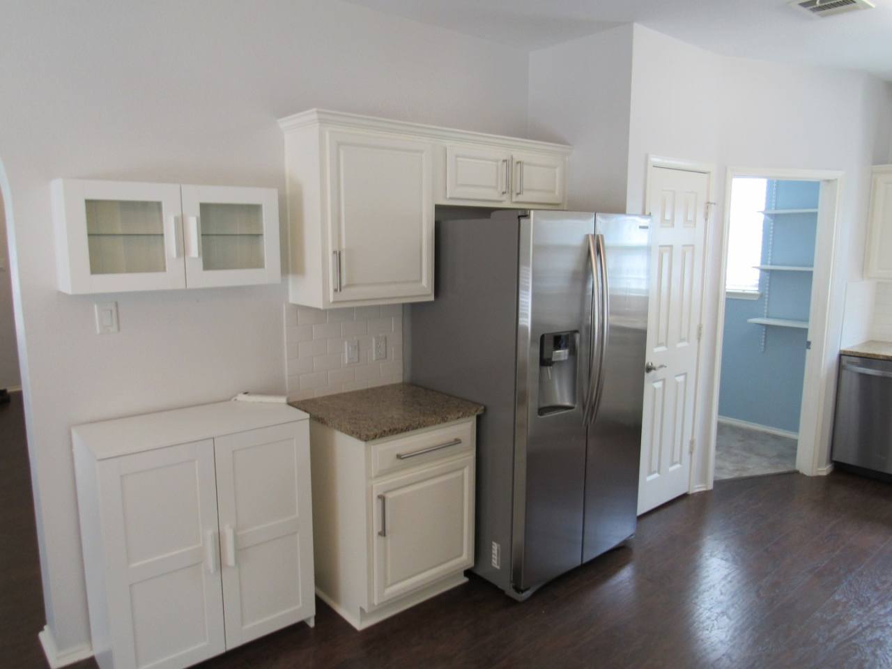 Cute two-story w/ white picket fence!