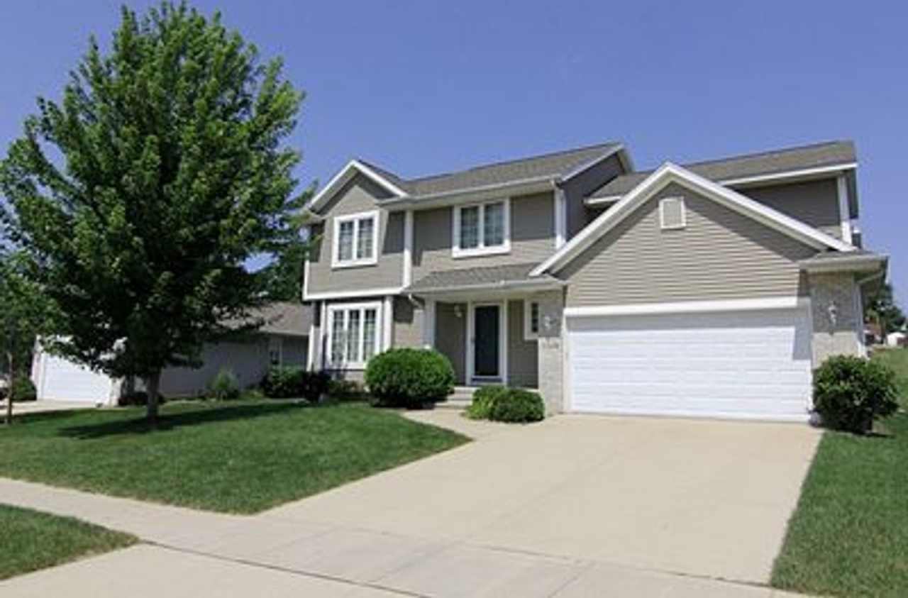 Great NE location - 4 bedroom 2.5 bath with attached 2 stall garage. Close to shopping  restaurants