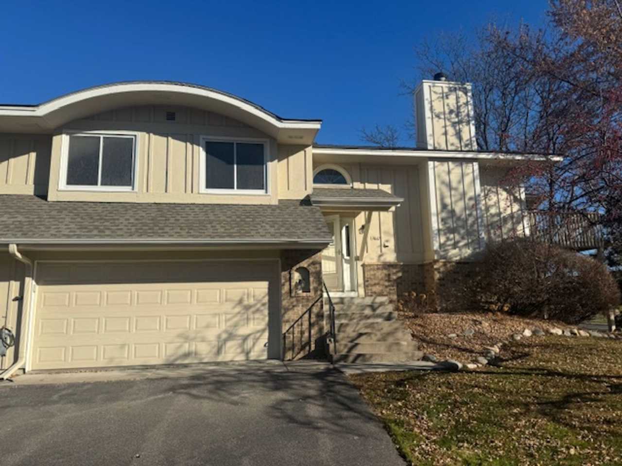 Beautifully Updated 3 Bed, 2 Bath, 2 Car Garage End Unit Townhome with Vaulted Ceilings