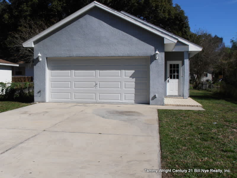 THREE BEDROOMS AND A TWO CAR GARAGE