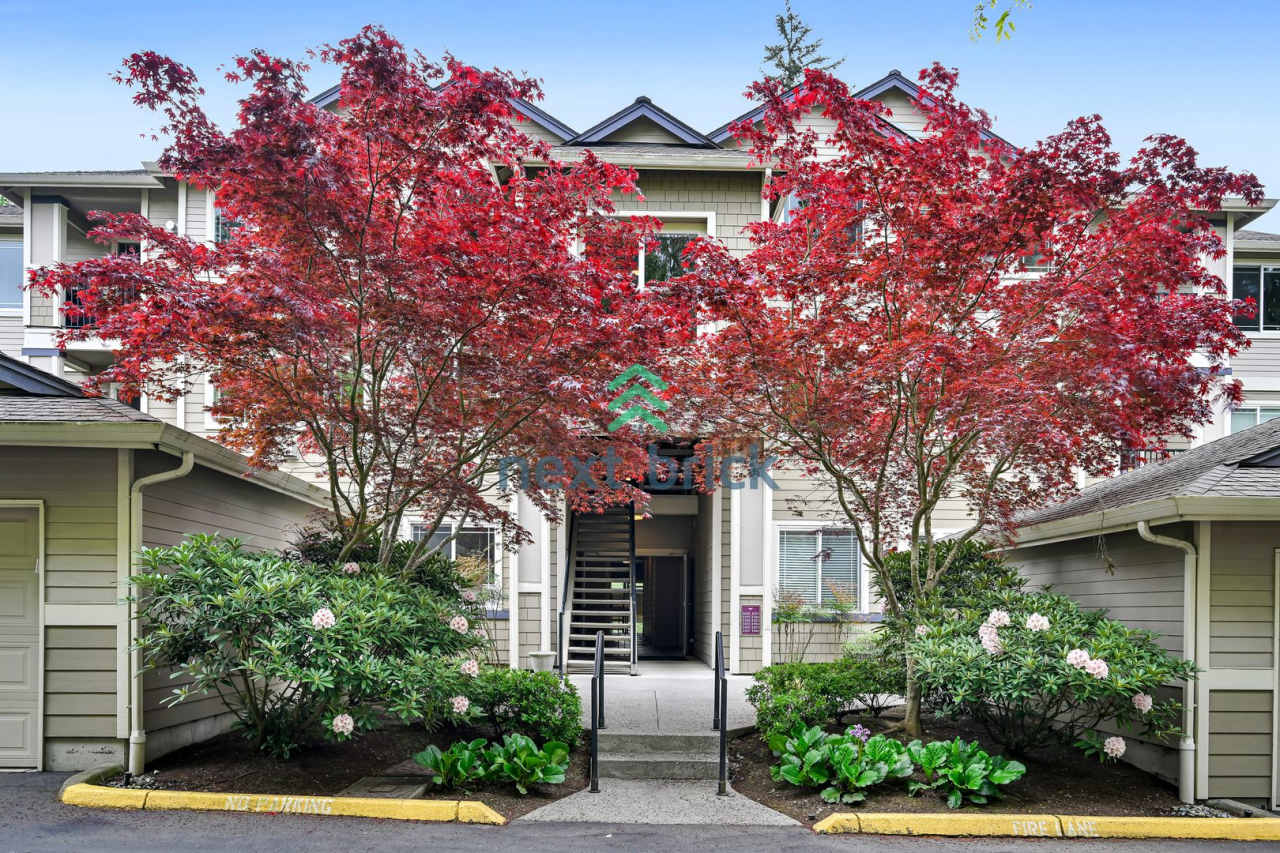 Rare Ground-Floor, End Unit with massive bonus office and Private 2-Car Garage!
