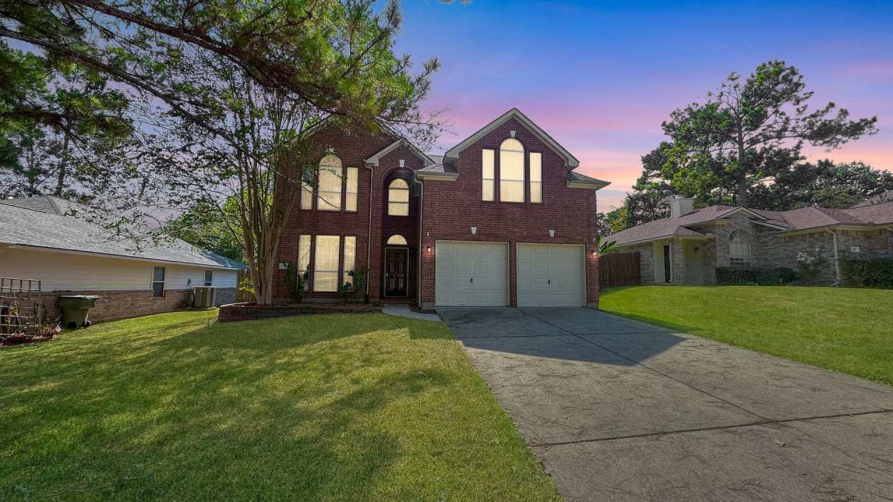 Spacious Two-Story Home Near Lake Conroe with Fireplace and Modern Comforts