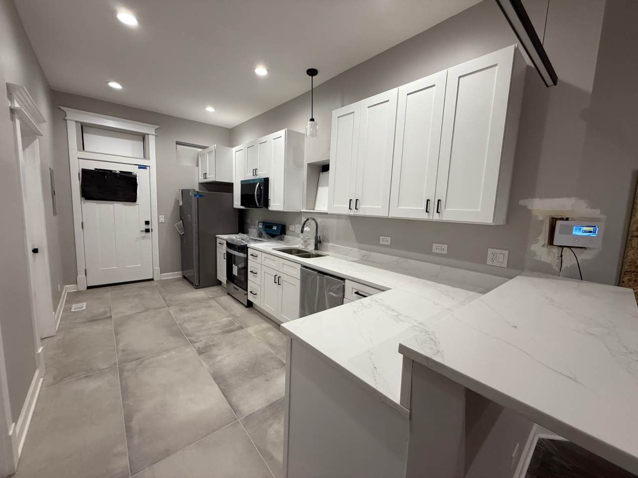 6443 South Peoria Street